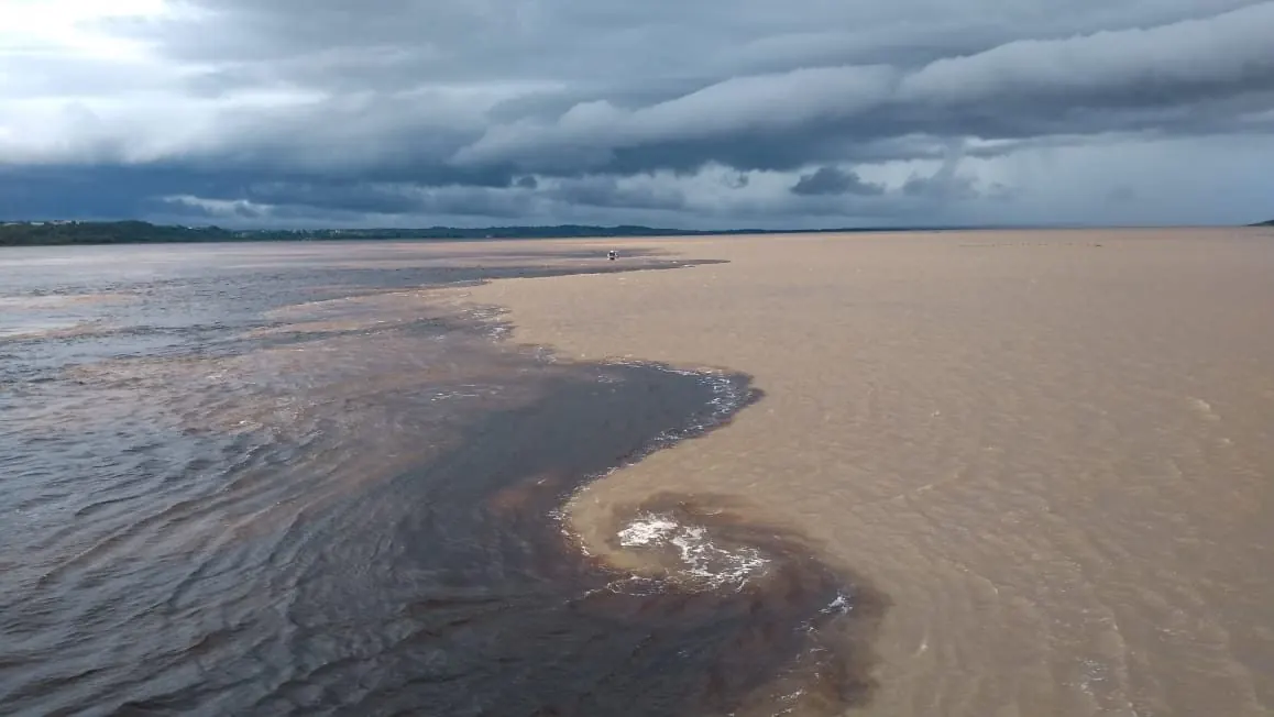 The Meeting of the Waters, where the dark Rio Negro and the sandy Solimões flow side by side without mixing